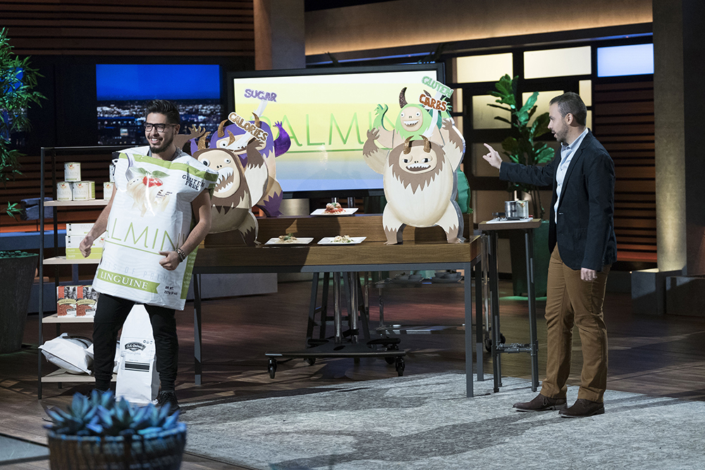 Alfonso (right) pitching Palmini on the set of “Shark Tank”