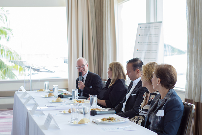 Moderator Alex Freund spices up the South Florida Executive Roundtable with his quick wit