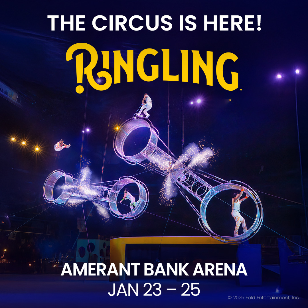 Four circus performers in white costumes balance and pose on large illuminated spinning wheels on a dark stage. The text announces "The Circus is Here! Ringling," at Amerant Bank Arena, Jan 23–25. South Florida Business & Wealth