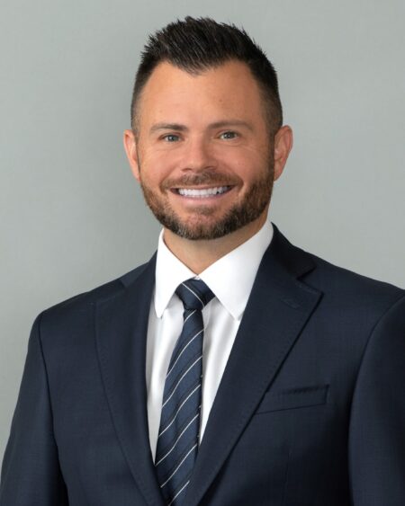 A man in a suit and tie. South Florida Business & Wealth