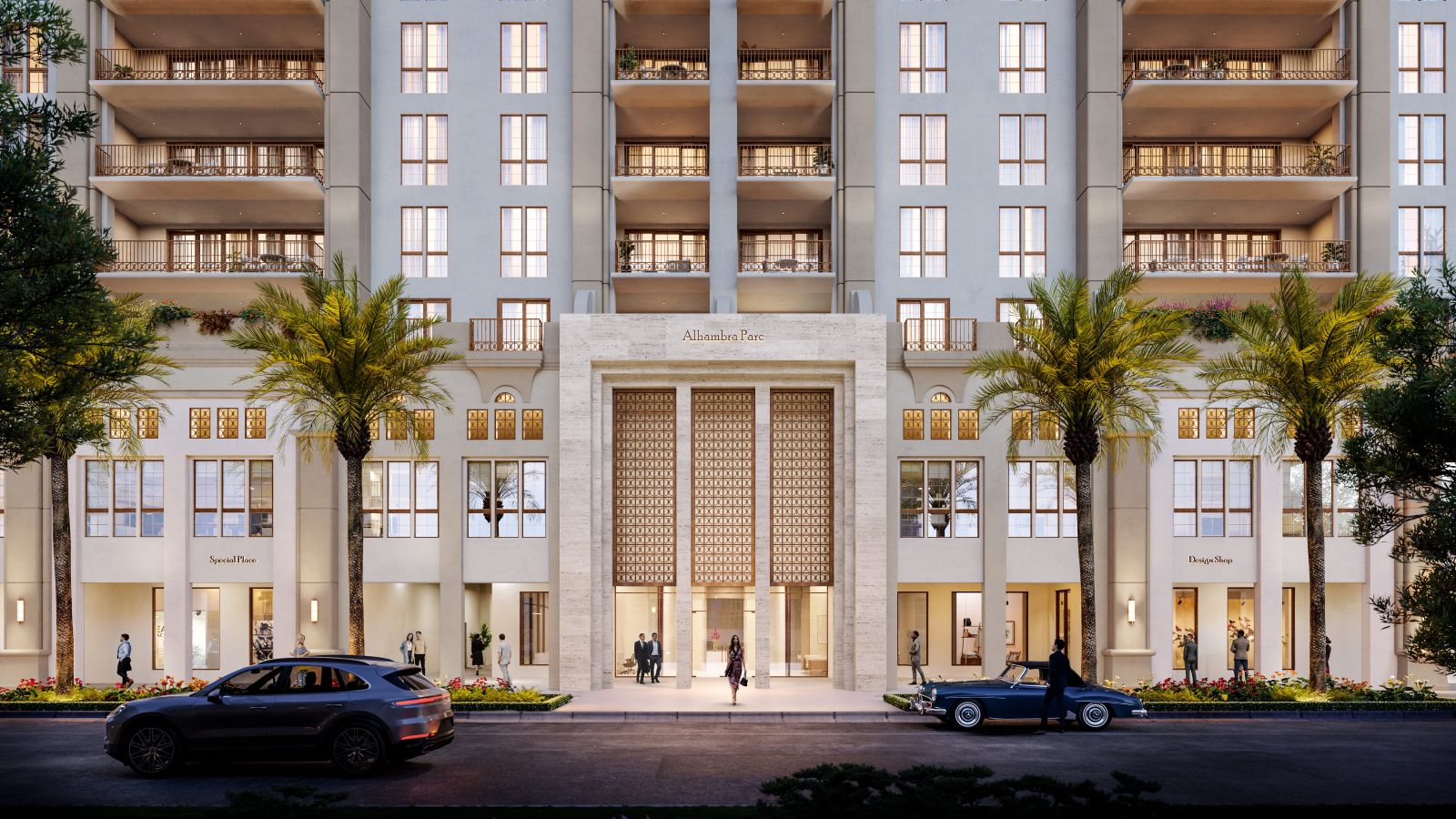 Street view of a modern, multi-story luxury apartment building with palm trees, large entrance, decorative facade, and retail shops. People walk by, and two cars are parked on the street in front of the building. South Florida Business & Wealth