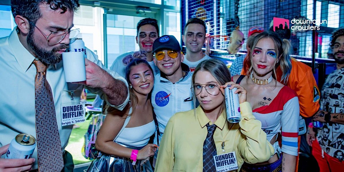 A group of people in costumes, including two dressed as Dwight Schrute and one as Harley Quinn, pose for a photo while holding drinks. South Florida Business & Wealth